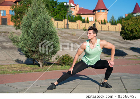 Athlete training on sunny summer day outdoors Athlete training on sunny summer day outdoors 83566455