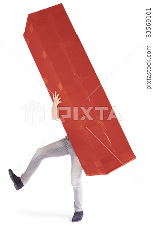 Man carrying a oversized red cardboard box 83569101