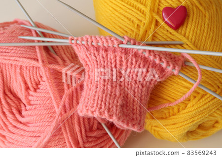 sock knitting needles and yellow and pink wool yarn sock knitting needles and yellow and pink wool yarn 83569243