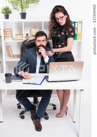 Successful business team. Man and attractive woman. 83569460