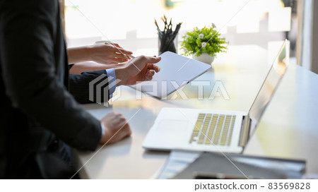 Businessman or male investment broker meeting with his business client. Businessman or male investment broker meeting with his business client. 83569828