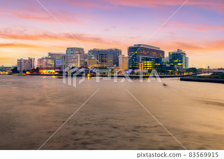 Public hospital, Faculty of Medicine Siriraj Hospital at twilight time in the Chao Phraya River, Bangkok 83569915