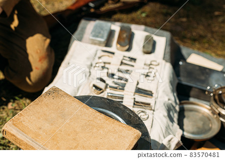 Old Medical And Surgical Instruments. Many Surgical Instruments For Surgery. Old Different Metal Medical Instruments Objects. Retro Stainless Surgical Equipment Tools. Black And White Toned Shot. 83570481