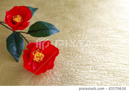 Camellia branches on golden background 83570638