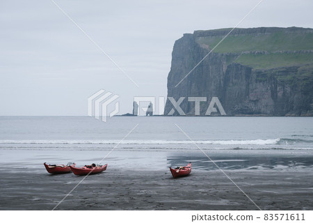 Kayaks by the ocean in the village of Tjornuvik, Faroe Islands Kayaks by the ocean in the village of Tjornuvik, Faroe Islands 83571611