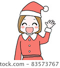一個女人打扮成聖誕老人，微笑著揮手 83573767
