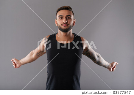 Man Stretching Chest Muscles 83577847