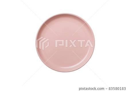 Pink ceramic round plate isolated over white background. Top view 83580183