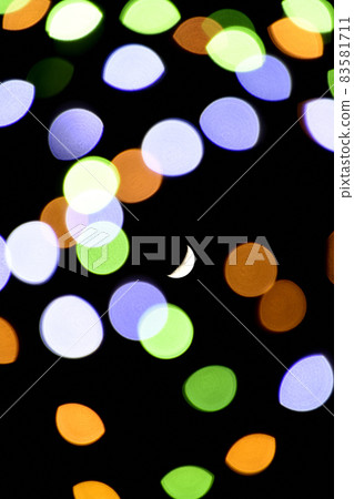 Crescent moon floating in bright illuminations Crescent moon floating in bright illuminations 83581711