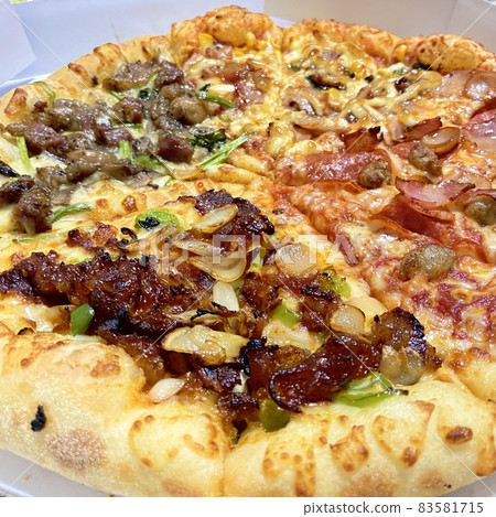 Close-up photo of 4 kinds of pizza 83581715