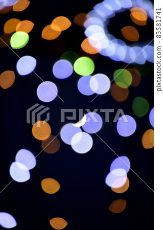 Crescent moon floating in bright illuminations Crescent moon floating in bright illuminations 83581741