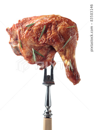 Grilled chicken leg with rosemary isolated on a white background. Grilled chicken leg with rosemary isolated on a white background. 83583146