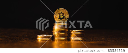 Cryptocurrency Growth Over Stacked Gold Bitcoin Coins Cryptocurrency Growth Over Stacked Gold Bitcoin Coins 83584319