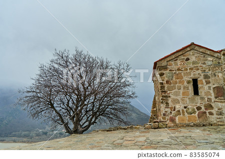 An old stone fortress in the mountains An old stone fortress in the mountains 83585074