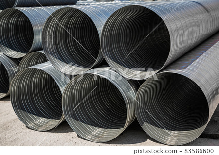 Ventilation pipe warehouse. Steel pipes, parts for the construction of air ducts for an industrial 83586600
