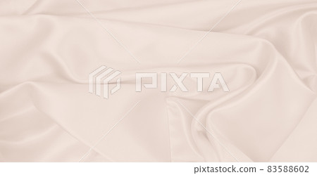 Smooth elegant golden silk or satin luxury cloth texture as wedding background. Luxurious background design. In Sepia toned. Retro style Smooth elegant golden silk or satin luxury cloth texture as wedding background. Luxurious background design. In Sepia toned. Retro style 83588602