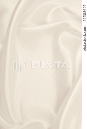 Smooth elegant golden silk or satin luxury cloth texture as wedding background. Luxurious background design. In Sepia toned. Retro style Smooth elegant golden silk or satin luxury cloth texture as wedding background. Luxurious background design. In Sepia toned. Retro style 83588605