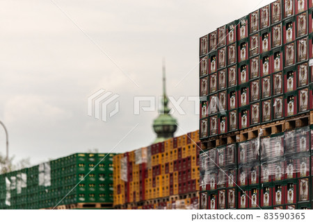 Brno, Czechia, 07.05.2019. Beer crates. Racks of beer boxes on pallets. Beer factory. Beer warehouse. 83590365