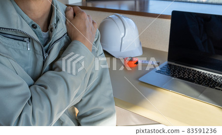 A man with stiff shoulders. Site supervision | Image of construction industry A man with stiff shoulders. Site supervision | Image of construction industry 83591236