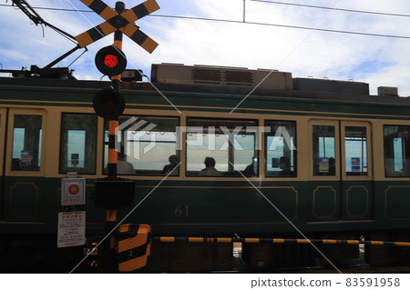 Railroad crossing at Kamakura High School Mae Station and Enoshima Electric Railway Railroad crossing at Kamakura High School Mae Station and Enoshima Electric Railway 83591958