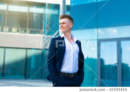 Business. Businessman Standing City Street Near Office Building . 83593454