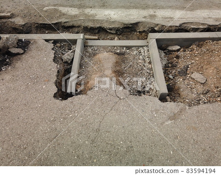 Pedestrian crossing repair in Russia. New curb stone installed for borderless space disabled people. Pedestrian crossing repair in Russia. New curb stone installed for borderless space disabled people. 83594194