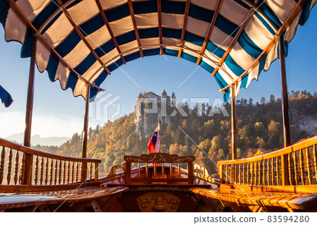 Traditional wooden boats on lake Bled, Slovenia. Traditional wooden boats on lake Bled, Slovenia. 83594280