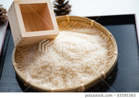 New white rice and wooden box New white rice and wooden box 83595363
