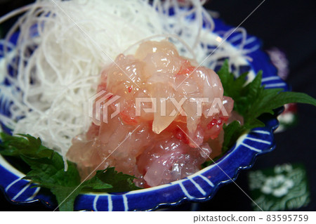 Sashimi of spiny lobster served in a small bowl of high legs Sashimi of spiny lobster served in a small bowl of high legs 83595759