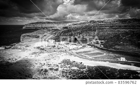 Flight over Dwerja Bay at the coast of Gozo Malta Flight over Dwerja Bay at the coast of Gozo Malta 83596762
