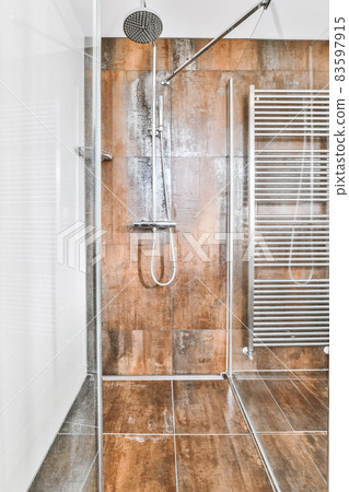 Design of contemporary shower tall with brown tiles 83597915