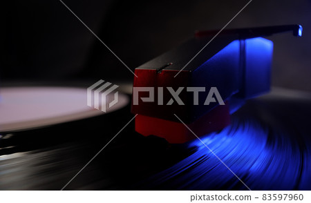 Amazing view over a record player playing a vinyl 83597960