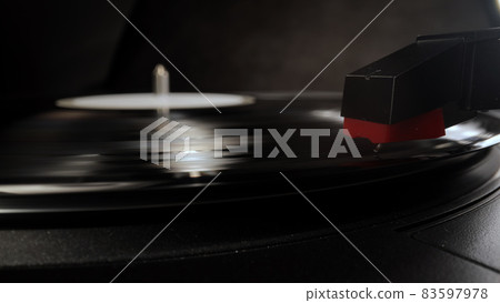 Amazing view over a record player playing a vinyl 83597978