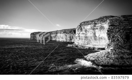 The amazing coast of Gozo - Malta with its steep cliffs The amazing coast of Gozo - Malta with its steep cliffs 83597979