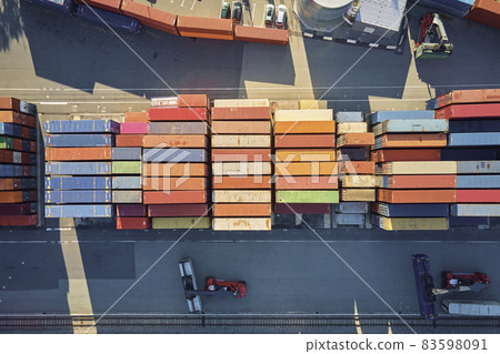 Containers warehouse, aerial view. Shipping and logistic concept Containers warehouse, aerial view. Shipping and logistic concept 83598091