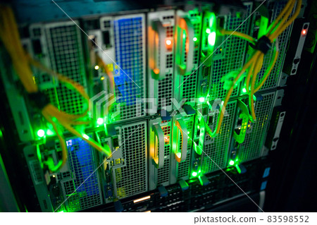 Closeup of computer server with colorful lights and wires Closeup of computer server with colorful lights and wires 83598552