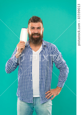 brutal caucasian hipster with moustache. Choosing  83599013