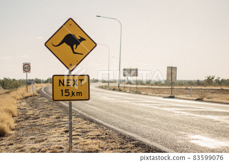 Signs of animal appearance on the road ahead 83599076