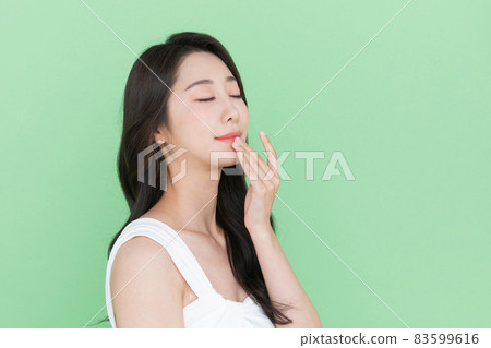 beauty concept, beautiful Korean Asian woman touching mouth, lips beauty concept, beautiful Korean Asian woman touching mouth, lips 83599616