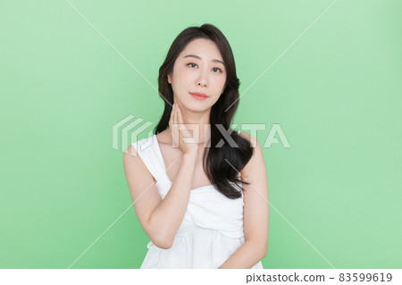 beauty concept, beautiful Korean Asian woman touching neck beauty concept, beautiful Korean Asian woman touching neck 83599619