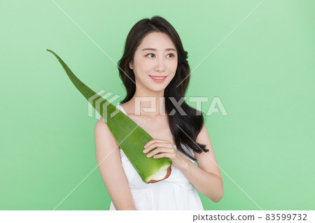 skin beauty concept, beautiful Korean Asian woman holding aloe skin beauty concept, beautiful Korean Asian woman holding aloe 83599732