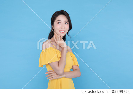 shopping event concept, smiling beautiful Korean Asian woman with hand near face shopping event concept, smiling beautiful Korean Asian woman with hand near face 83599794