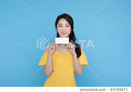 shopping event concept, beautiful Korean Asian woman with coupon 83599871