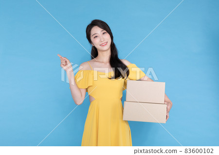 shopping event concept, beautiful Korean Asian woman with delivery box shopping event concept, beautiful Korean Asian woman with delivery box 83600102