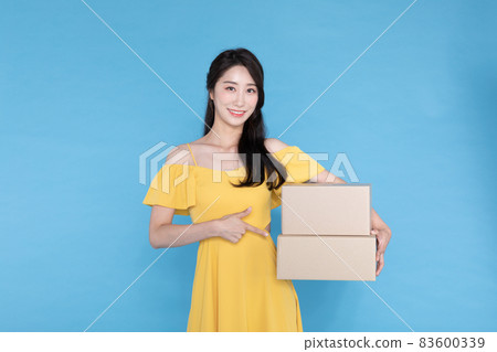 shopping event concept, beautiful Korean Asian woman with delivery box shopping event concept, beautiful Korean Asian woman with delivery box 83600339