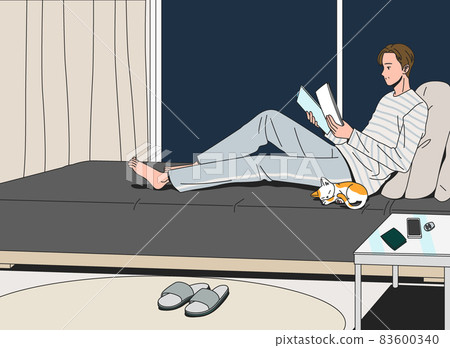 a day of middle aged single man, working on bed with cat a day of middle aged single man, working on bed with cat 83600340