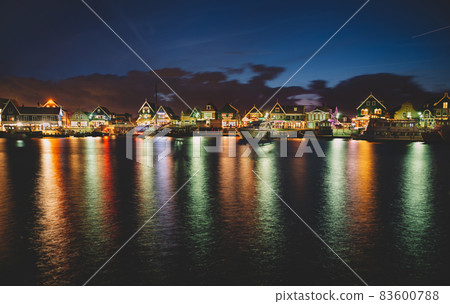 House light trails and boats in the evening sea House light trails and boats in the evening sea 83600788