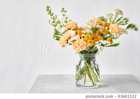 Finished flower arrangement in a vase for home. Flowers bunch, set for interior. Fresh cut flowers for decoration home. European floral shop. Delivery fresh cut flower. 83601332