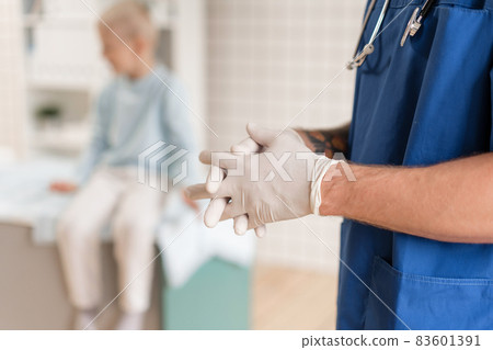 Concept. The doctor's hands are in the foreground. A pediatrician diagnoses lung disease and provides treatment. Concept. The doctor's hands are in the foreground. A pediatrician diagnoses lung disease and provides treatment. 83601391