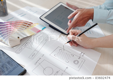 Team of Designers Working on Interface Team of Designers Working on Interface 83602474